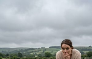 I was mourning my twin daughters at their grave, blinded by tears, when a little boy tugged on my coat and said, ‘Mom… those girls are in my class.’ In that single, heart-stopping moment, my grief turned into a terrifying mystery.